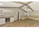 Open floor plan featuring kitchen, living room, vaulted ceiling and light, airy space at 26098 Constantine Rd, Punta Gorda, FL 33983