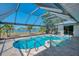Gorgeous screened-in pool and spa, offering a serene outdoor retreat with lovely water views at 26098 Constantine Rd, Punta Gorda, FL 33983