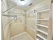 Large walk-in closet with wire shelving and rods at 26098 Constantine Rd, Punta Gorda, FL 33983