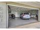 Attached garage with space for two cars and motorcycle at 3431 Montgomery Dr, Port Charlotte, FL 33981