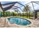 Inviting screened pool with ample deck space at 3431 Montgomery Dr, Port Charlotte, FL 33981