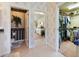 View of the bathroom, closet, and main bedroom from the hallway at 385 Pelican Bnd, Placida, FL 33946