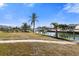 Scenic canal view with boats and docks at 385 Pelican Bnd, Placida, FL 33946