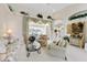 Bright living room with stylish furniture and view of the patio at 385 Pelican Bnd, Placida, FL 33946