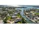 Scenic waterfront property in a charming community with boats, docks, and lush greenery at 385 Pelican Bnd, Placida, FL 33946