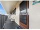 Condo balcony with a door, providing access to the unit at 4260 Placida Rd # 14C, Englewood, FL 34224