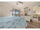 Main bedroom with water view and dresser at 4260 Placida Rd # 14C, Englewood, FL 34224