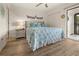 Bright bedroom with a comfortable bed and plenty of closet space at 4260 Placida Rd # 14C, Englewood, FL 34224
