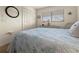 Guest bedroom with full-size bed and wood dresser at 4260 Placida Rd # 14C, Englewood, FL 34224