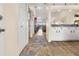 Bright condo entryway with a view into the living area and kitchen at 4260 Placida Rd # 14C, Englewood, FL 34224