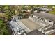 Community pool with covered patio and lounge chairs at 4260 Placida Rd # 14C, Englewood, FL 34224