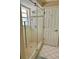 Bathroom with a walk-in shower and updated fixtures at 4656 Pompano St, Placida, FL 33946