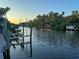 Scenic waterfront property with boat lift and peaceful canal views at 4656 Pompano St, Placida, FL 33946