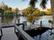 Relaxing dockside view with chairs, ready to enjoy the water at 4656 Pompano St, Placida, FL 33946