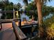 Private dock with seating, perfect for enjoying sunset views at 4656 Pompano St, Placida, FL 33946