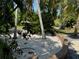 Mature tropical landscaping surrounds this property, creating a lush and inviting oasis at 4656 Pompano St, Placida, FL 33946