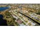 An aerial view of a neighborhood and surrounding areas with canals at 47 Sportsman Ln, Rotonda West, FL 33947