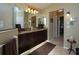 Spacious bathroom featuring double sinks, large mirror, and ample counter space at 47 Sportsman Ln, Rotonda West, FL 33947