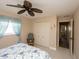 Guest bedroom with a closet, ceiling fan, and carpeted flooring at 47 Sportsman Ln, Rotonda West, FL 33947