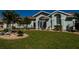 Inviting single story home with landscaped front yard and attached garage at 47 Sportsman Ln, Rotonda West, FL 33947