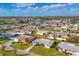 Aerial view of waterfront homes in a residential neighborhood at 521 Shamrock Blvd, Venice, FL 34293