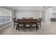 Bright dining room with a large wooden table and six chairs at 521 W Tarpon Nw Blvd, Port Charlotte, FL 33952