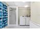 Laundry room with washer, dryer and shower at 537 Shamrock Blvd, Venice, FL 34293