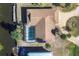An aerial view of a home with screened-in pool and a private boat dock at 560 Sandlor Dr, Englewood, FL 34223