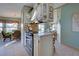 Kitchen with island and stainless steel appliances at 6375 Partridge Ave, Englewood, FL 34224