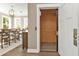 Modern home elevator located near the dining area at 7064 Baypine Ln, Englewood, FL 34224