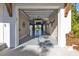 Spacious garage with storage and a car lift at 7064 Baypine Ln, Englewood, FL 34224
