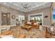 Inviting living room open to the kitchen and dining areas at 7064 Baypine Ln, Englewood, FL 34224