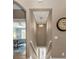 View of the staircase leading downstairs from the second floor at 7064 Baypine Ln, Englewood, FL 34224