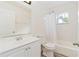 Clean bathroom featuring a shower-tub combination, a white vanity and modern fixtures at 792 Lehigh Rd, Venice, FL 34293