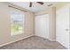 Spacious bedroom with a large closet and window at 792 Lehigh Rd, Venice, FL 34293