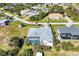An aerial view of the home, pool and surrounding neighborhood at 9131 Berendo Ave, Englewood, FL 34224