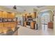 Spacious kitchen with ample storage, stainless steel appliances and tile flooring at 9131 Berendo Ave, Englewood, FL 34224