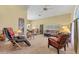 Welcoming living area with high ceilings, natural light and plush seating at 9131 Berendo Ave, Englewood, FL 34224
