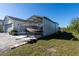 Covered boat storage area with a boat on a trailer at 9300 Miami Cir, Port Charlotte, FL 33981