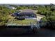Waterfront home with pool, screened patio, and boat dock at 9300 Miami Cir, Port Charlotte, FL 33981