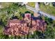 Top-down view of the home's unique tile roof and layout at 99 W Riverview Ave, Englewood, FL 34223