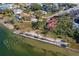 Aerial view showcasing home's waterfront location and neighborhood context at 99 W Riverview Ave, Englewood, FL 34223