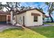 Additional exterior view of the property, showcasing its unique style at 99 W Riverview Ave, Englewood, FL 34223