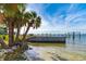 Waterfront view with concrete dock and calm water views at 99 W Riverview Ave, Englewood, FL 34223