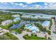 Community with a pool, clubhouse, and waterfront views at 10300 Coral Landings Ct # 91, Placida, FL 33946