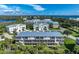 Community overview, showcasing a collection of upscale townhouses at 10300 Coral Landings Ct # 91, Placida, FL 33946