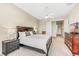 Spacious bedroom with king-size bed, nightstands, and ample closet space at 10300 Coral Landings Ct # 91, Placida, FL 33946