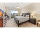 King bedroom with private balcony and large window at 10300 Coral Landings Ct # 91, Placida, FL 33946
