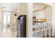 Modern kitchen with white cabinets, granite countertops, and breakfast bar at 10300 Coral Landings Ct # 91, Placida, FL 33946