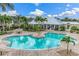 Freeform swimming pool with surrounding patio at 10300 Coral Landings Ct # 91, Placida, FL 33946